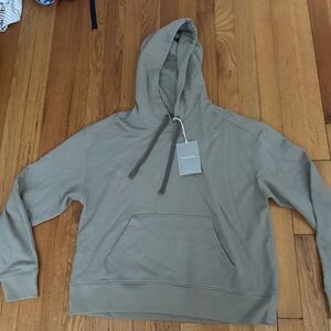 never worn new with tags! everlane sweatshirt! light green color!